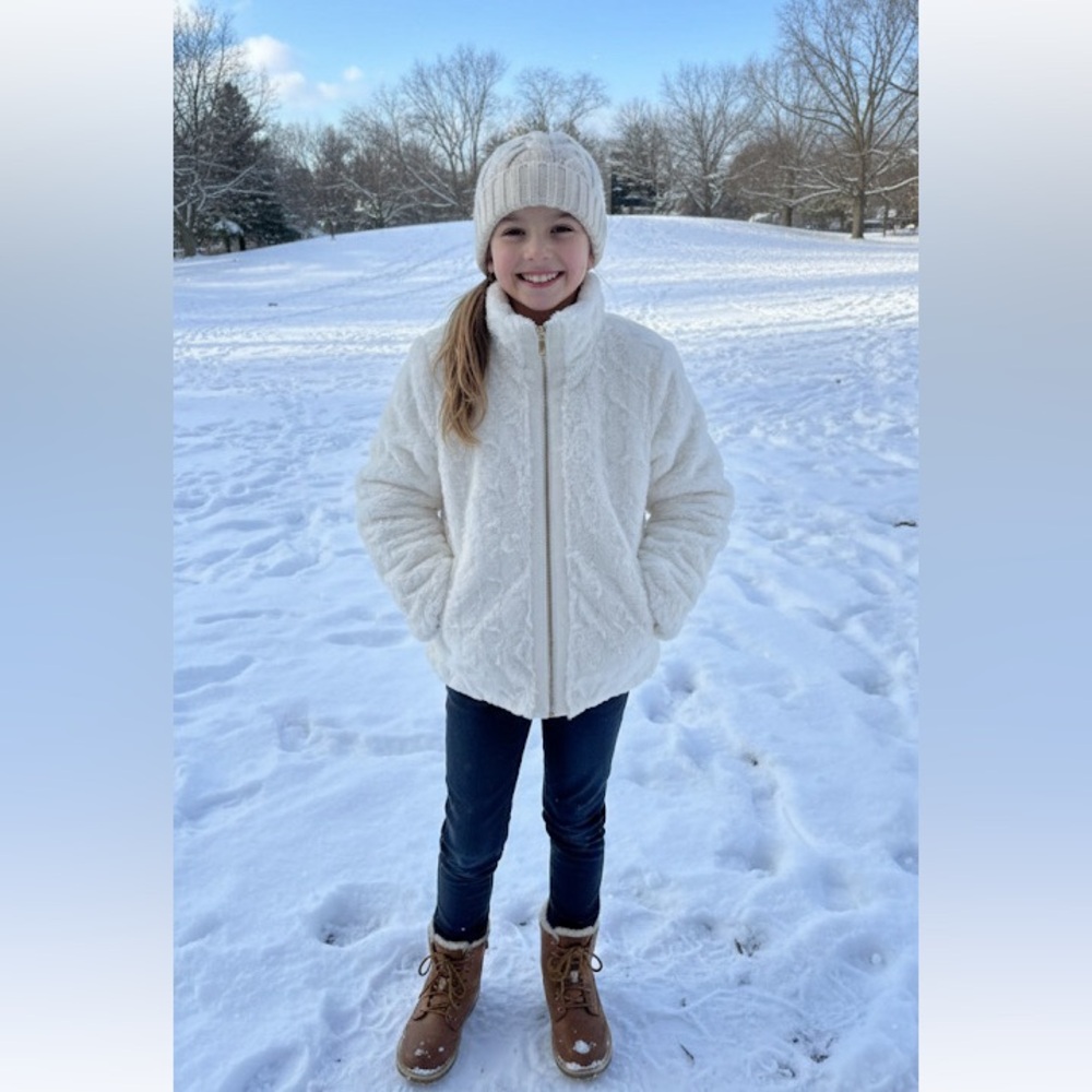 furry jacket.  New  size 10-12